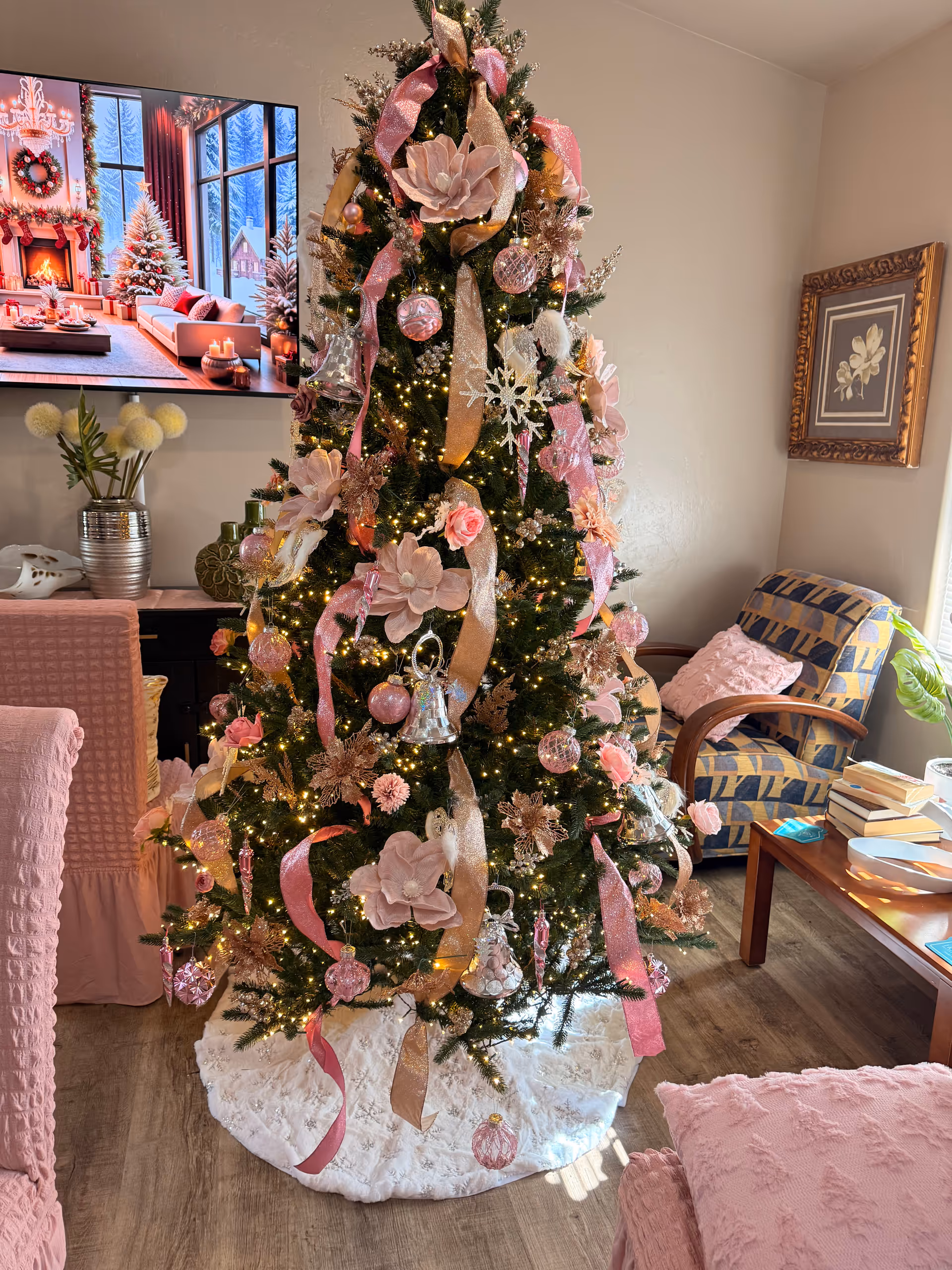 Pink-themed Christmas tree with ribbons and lights stands in a cozy living room.