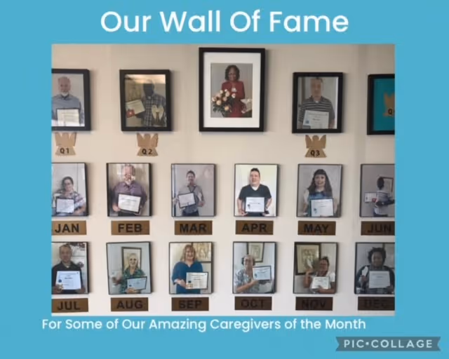 Interior wall display Our Wall Of Fame featuring framed caregiver photos by month.