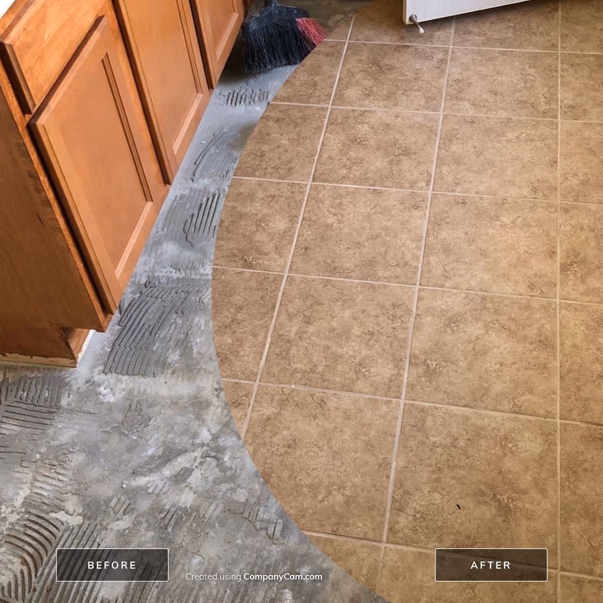 Interior kitchen area with tile floor, curved concrete edge, and wooden cabinets.