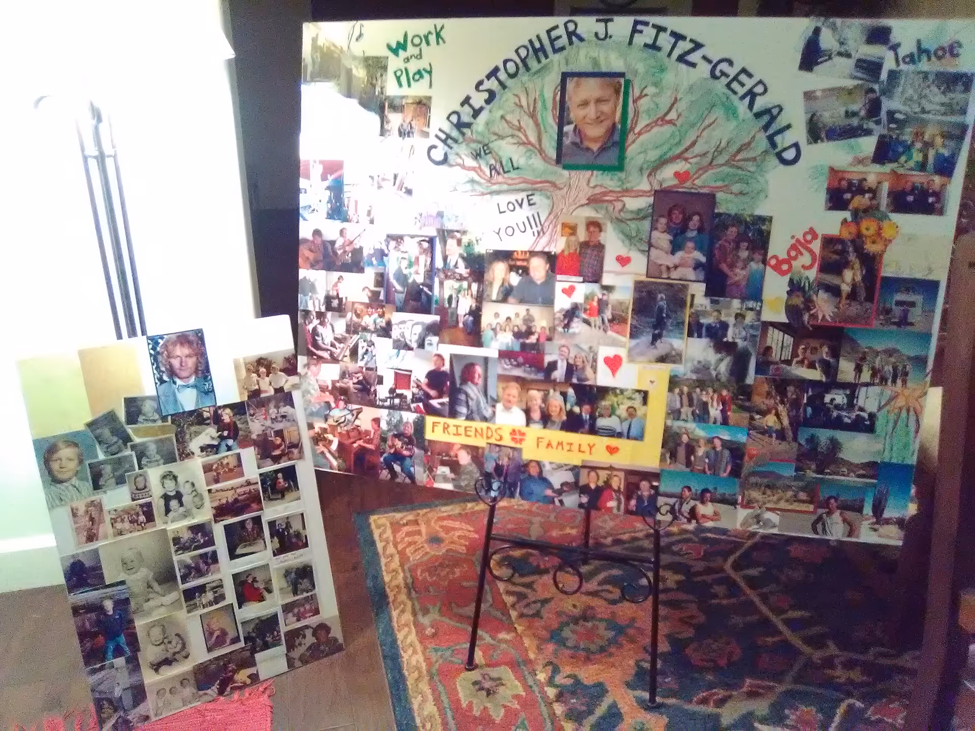 A large photo collage wall featuring a tree mural and numerous resident photos.