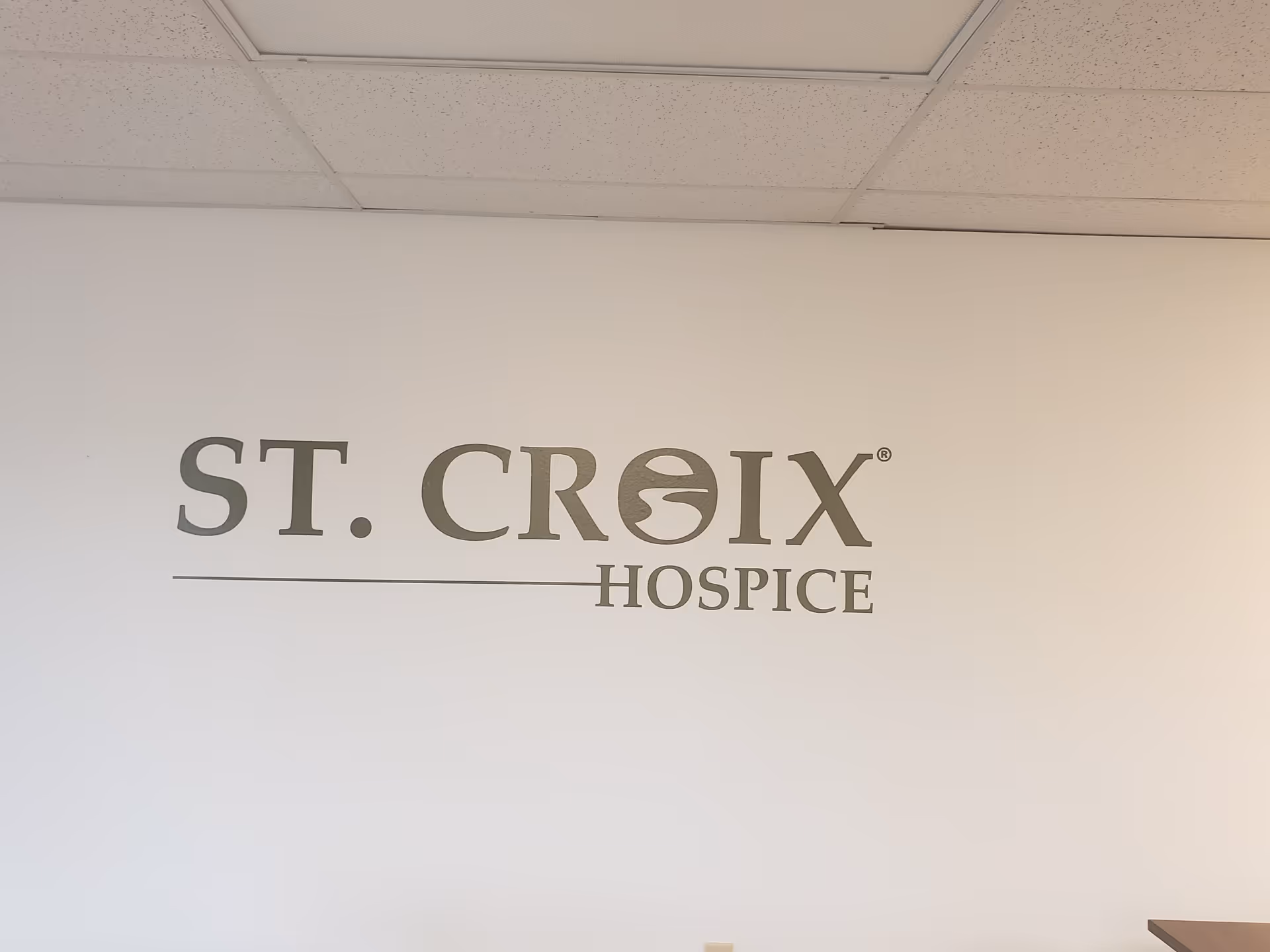 Interior wall featuring a large ST. CROIX HOSPICE sign.