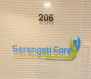 Interior wall with room number 206 and Serengeti Care logo.