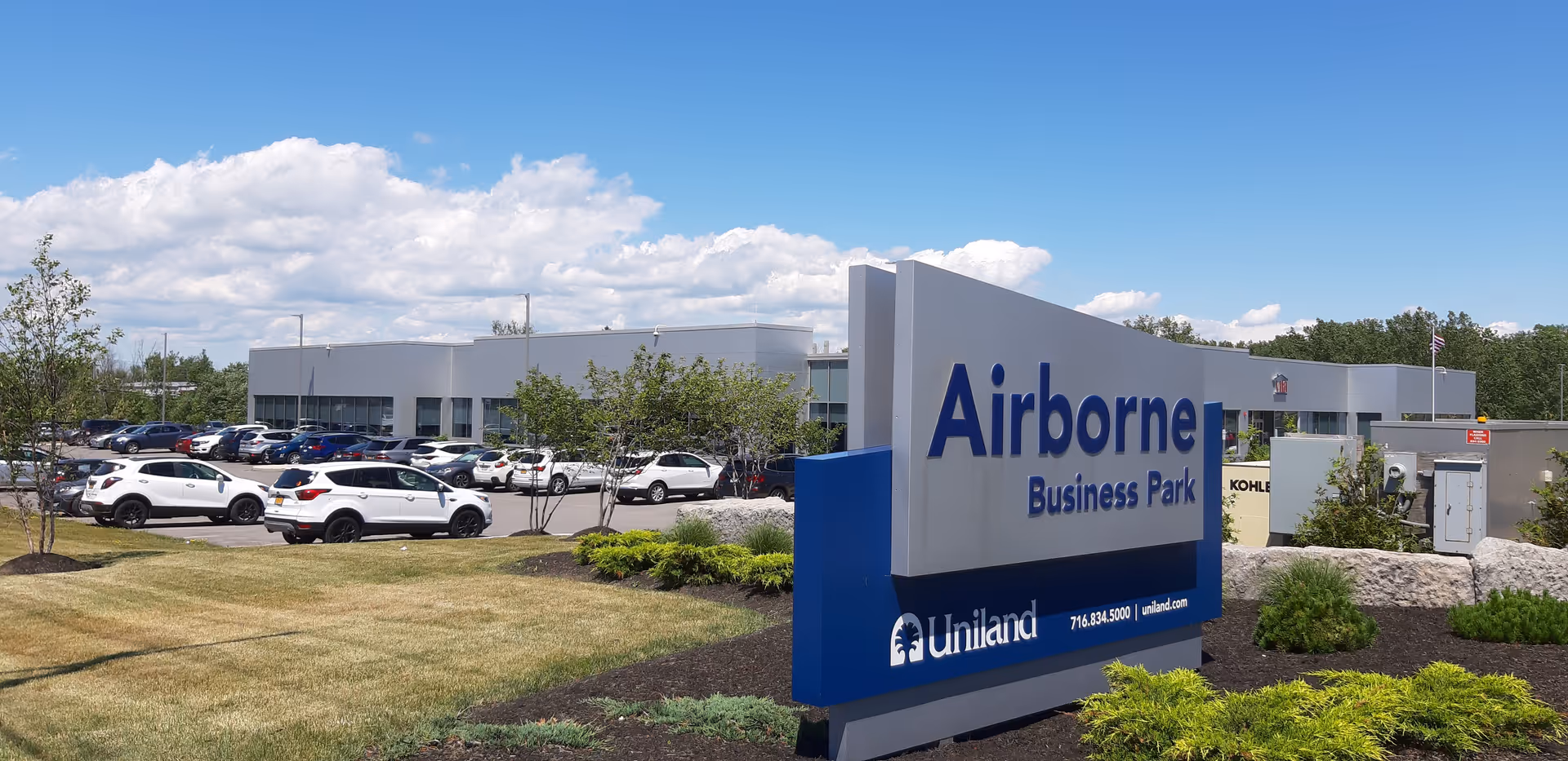 Exterior view of Airborne Business Park office complex and parking lot.