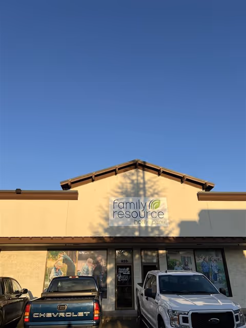 Front view of Family Resource Home Care building with parked cars in front