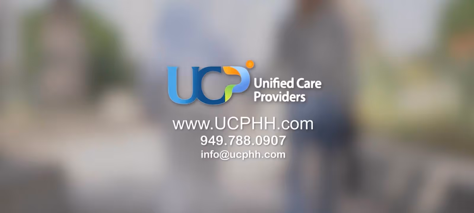 Blurred interior lobby featuring Unified Care Providers home health care logo and contact details.