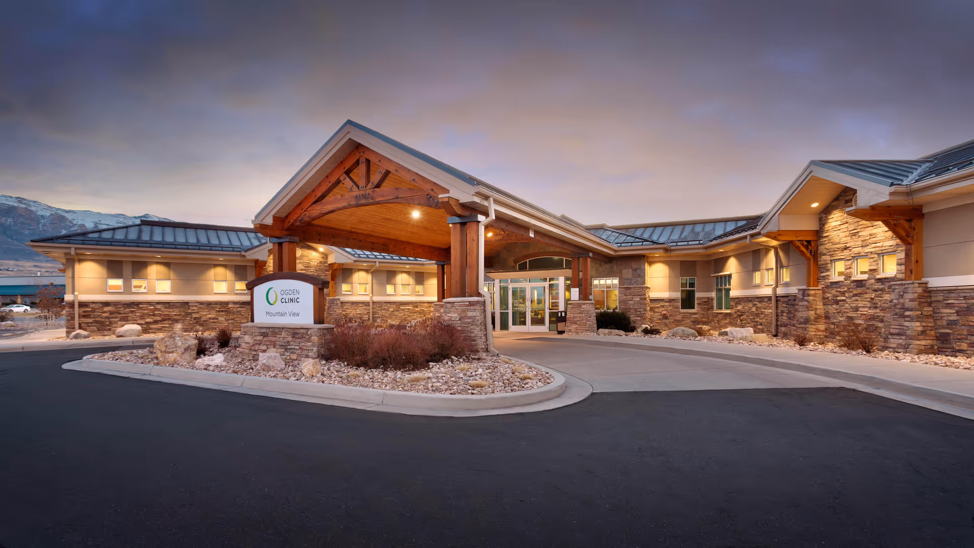 Exterior view of Ogden Clinic Mountain View entrance with stone facade.