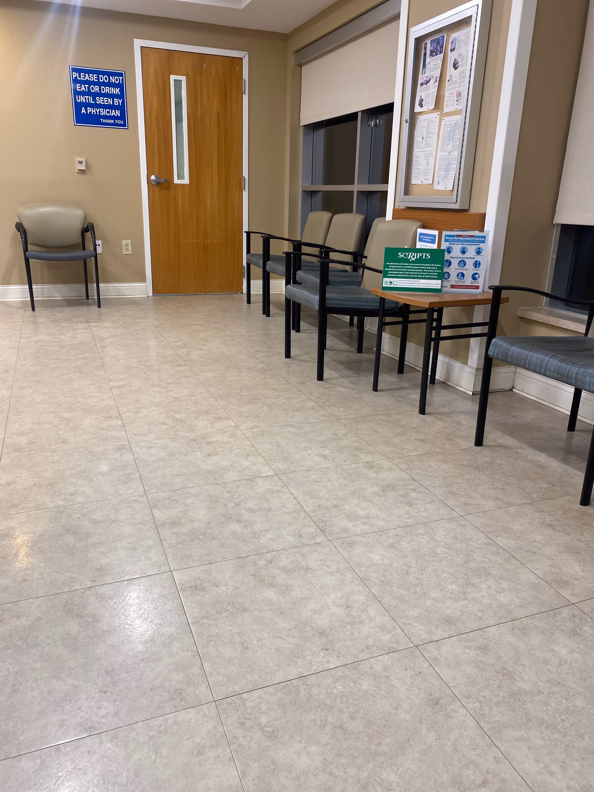 Empty waiting area at MUSC Health Kershaw Medical Center with chairs along the wall.