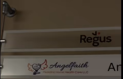 Interior signs show AngelFaith Pediatric Home Health Care LLC branding and Regus logo.
