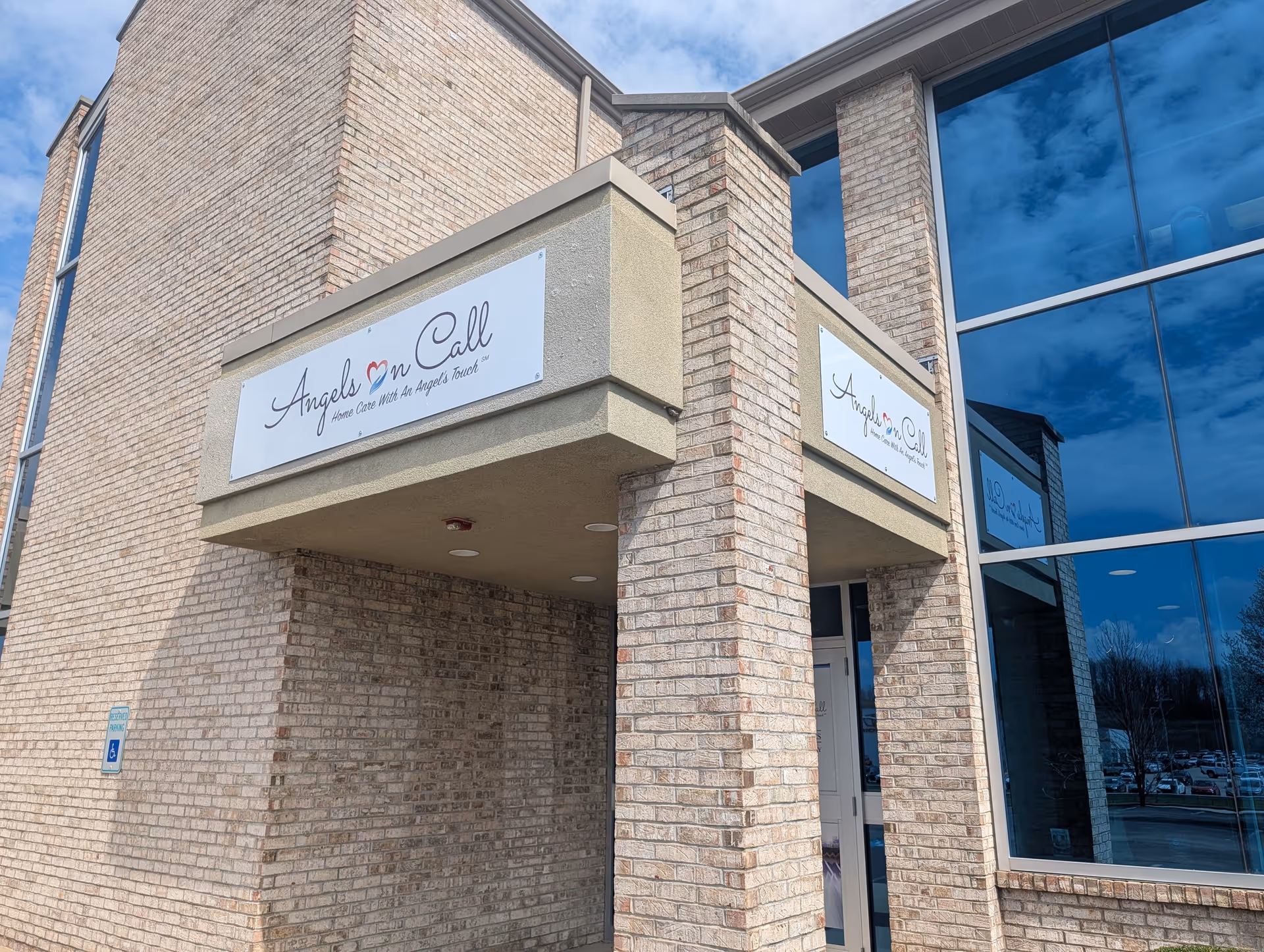 Exterior view of Angels On Call Home Care building entrance with brick facade