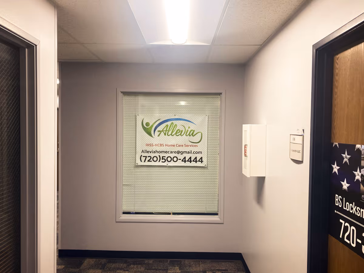 Interior hallway with window sign for Allevia Home Care Services
