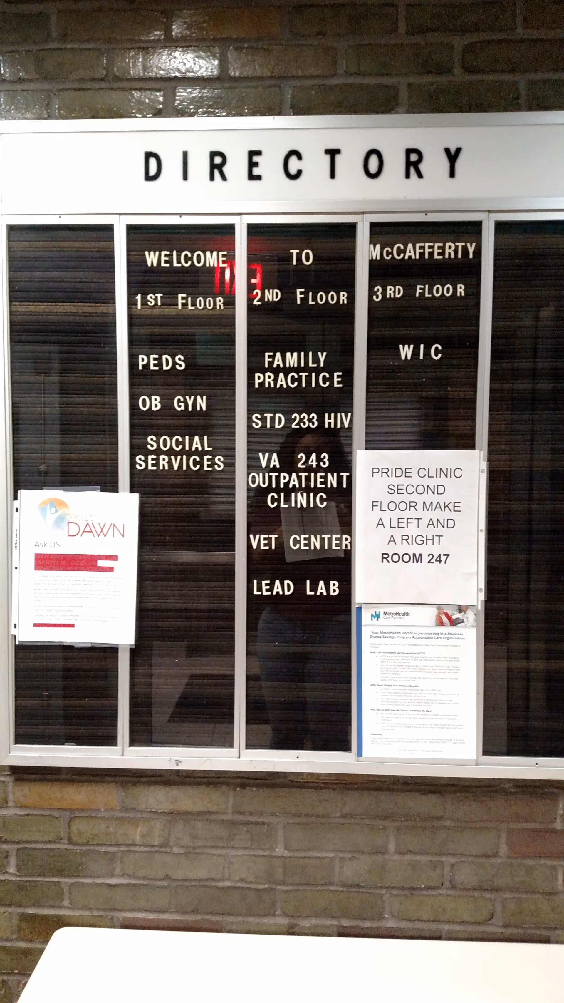 Directory board in hallway listing floors and offices at Thomas F. McCafferty Health Center.