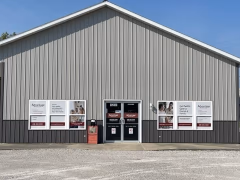 Exterior view of Advantage Home Care building with front entrance and signage.