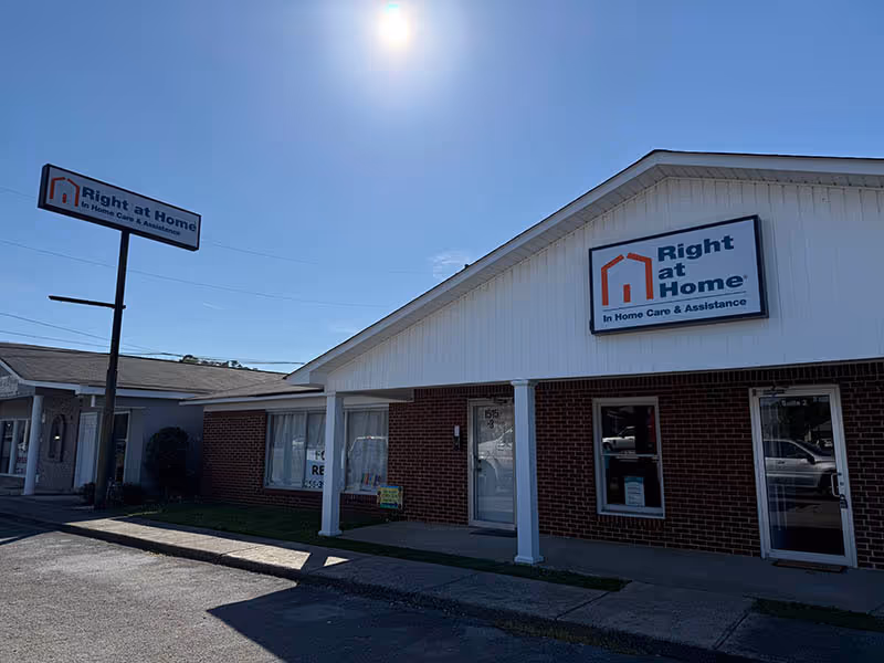 Exterior view of a Right at Home senior care building with front signage.