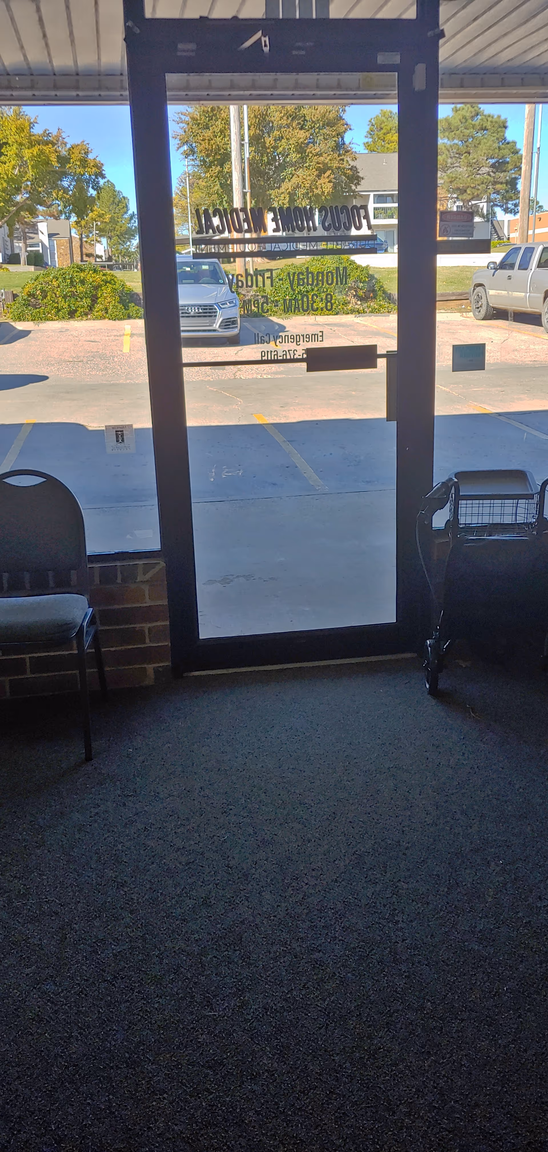 Interior view of Focus Home Medical entrance with glass door and parking lot outside.