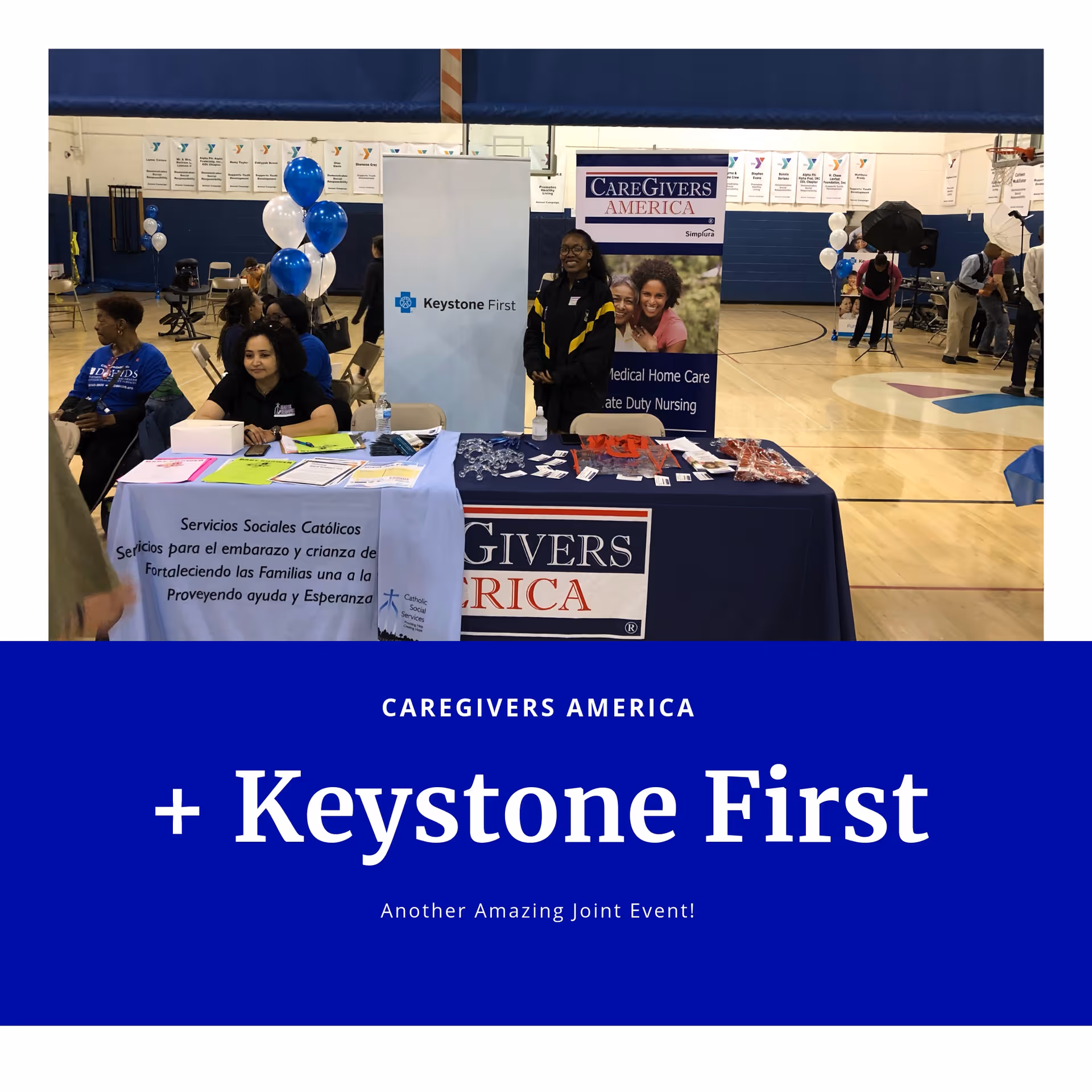 CareGivers America booth set up in a gym with banners and staff.