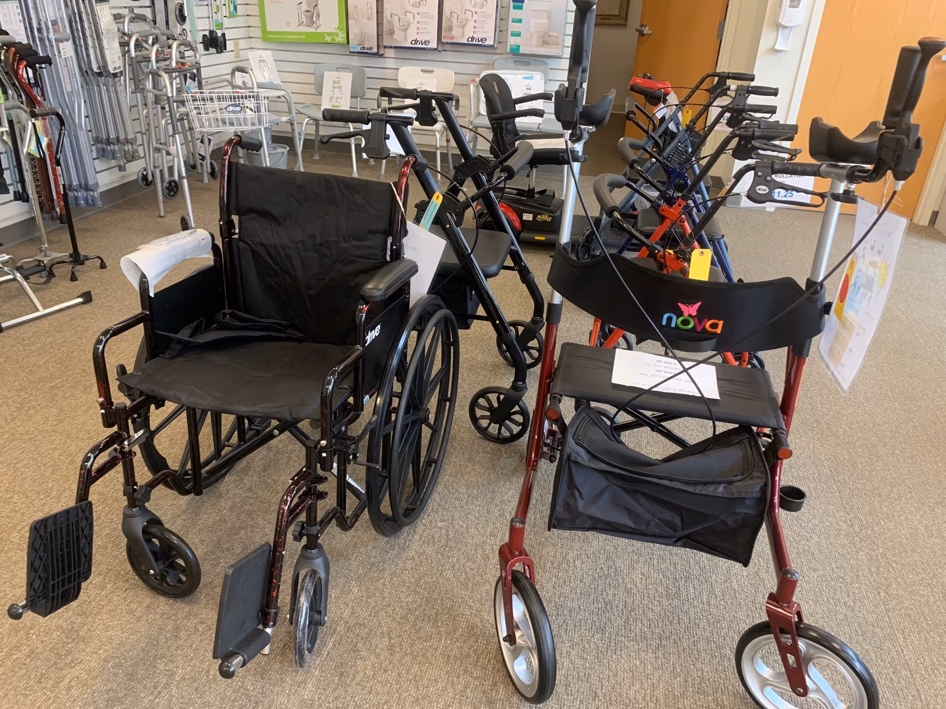 Wheelchairs and mobility aids on display in an interior showroom