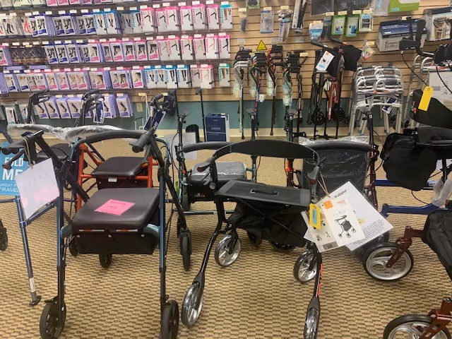 Indoor display of walkers, rollators, and mobility aids in a storefront setting