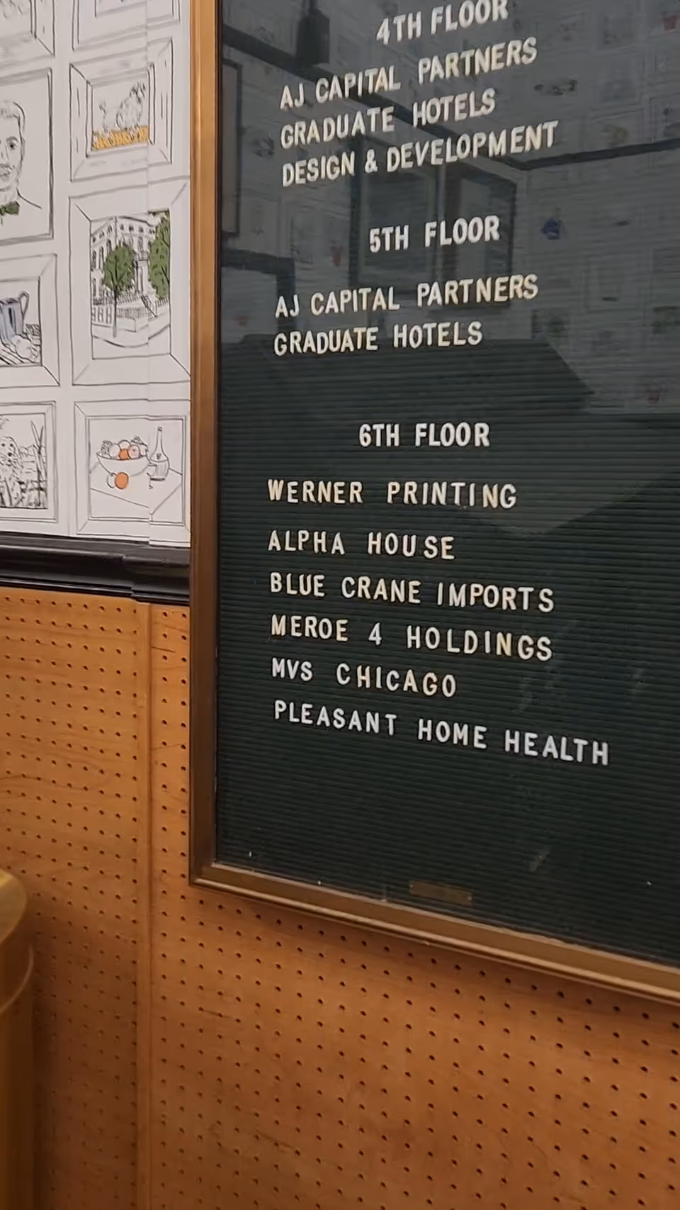 Indoor hallway with a multi-floor directory board listing tenants including Pleasant Home Health.
