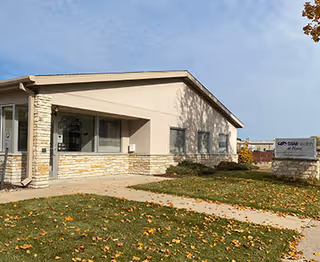 Single-story SSM Health at Home facility with stone accents and a front entrance.