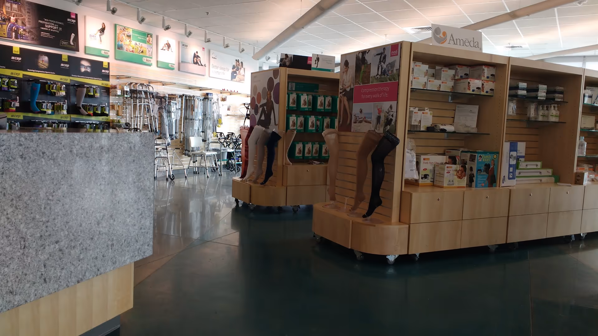 Interior view of a retail medical supply showroom with shelves, displays, and equipment.