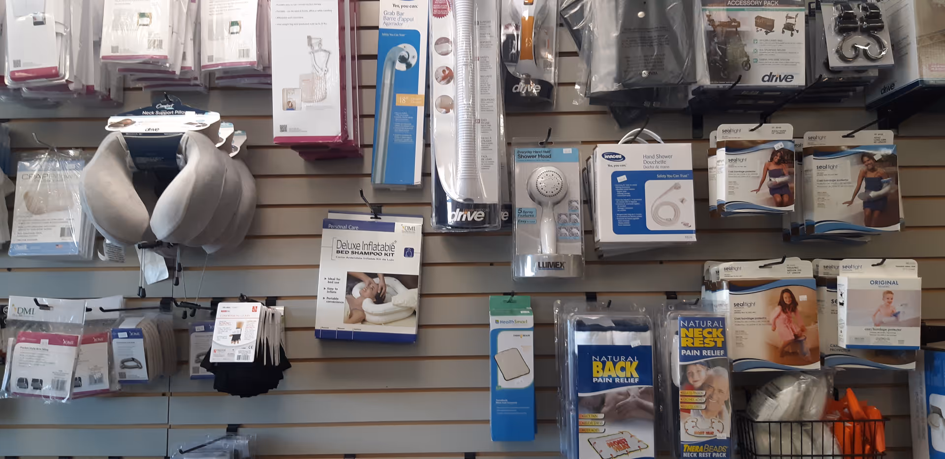 Wall display of home health care products and medical accessories in a retail setting.