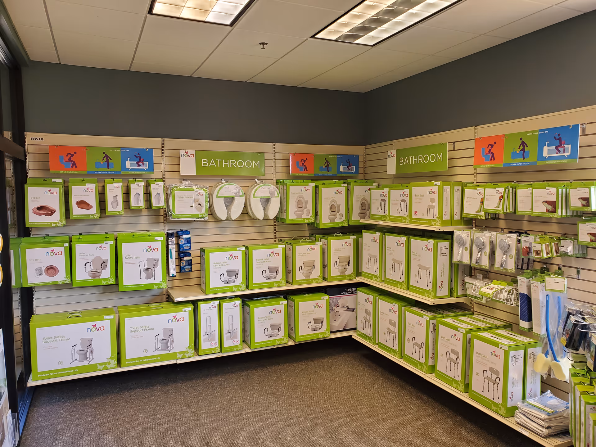 Interior store area at Alick's Home Medical showing shelves of bathroom safety products.