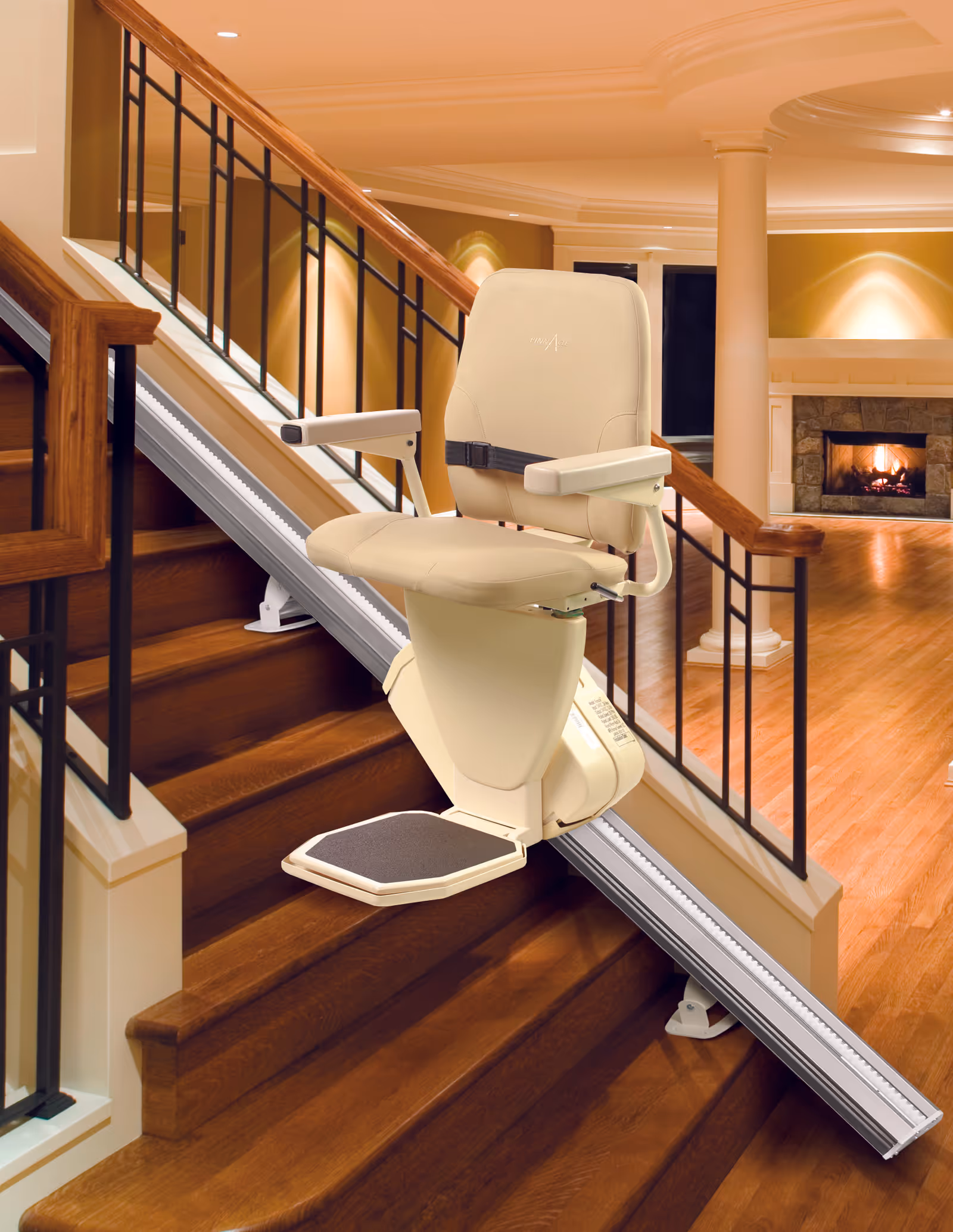 Beige stairlift chair mounted on wooden stairs inside a warm, upscale interior.