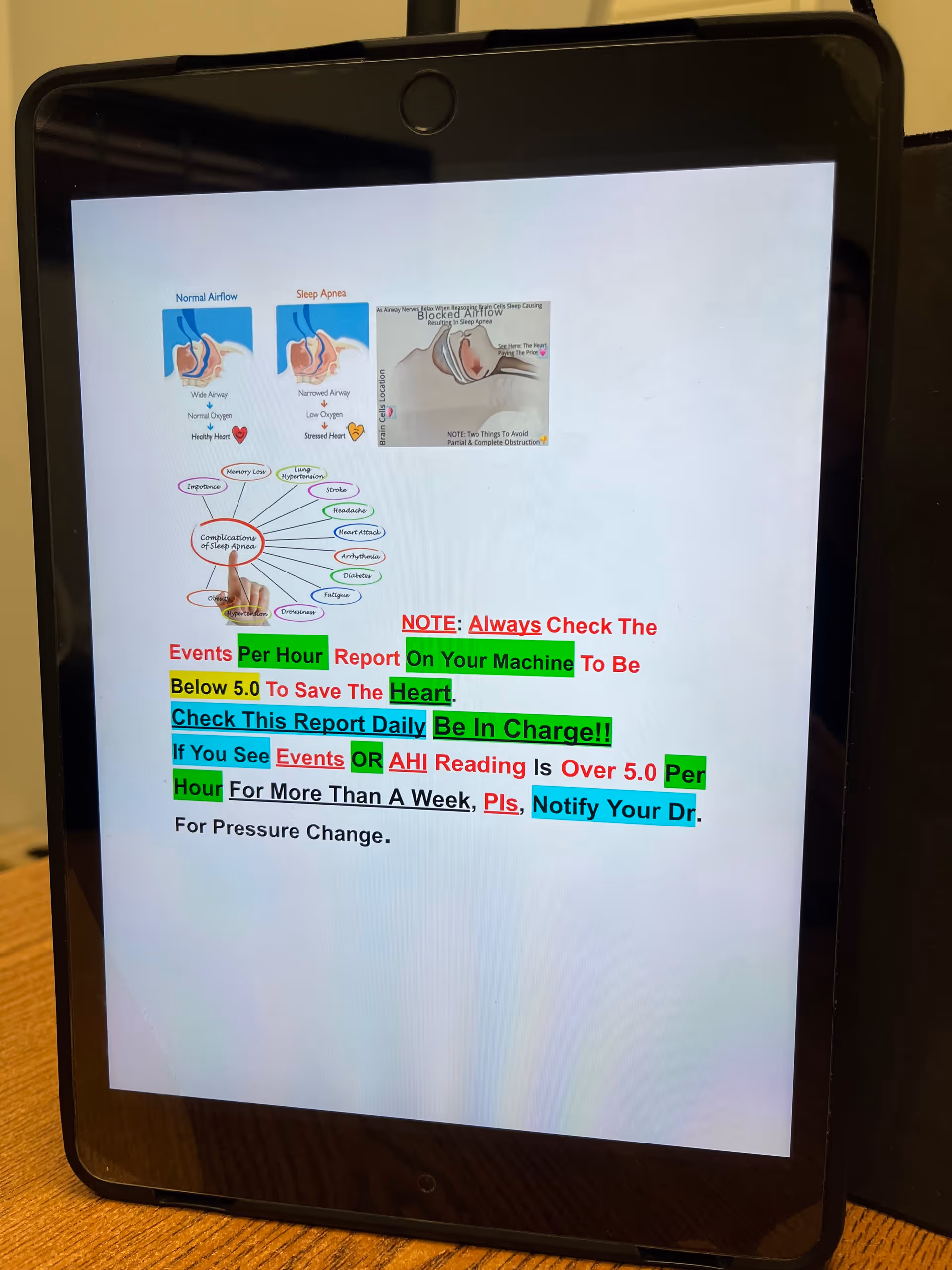 Tablet on a stand displays a sleep apnea infographic with highlighted notes.