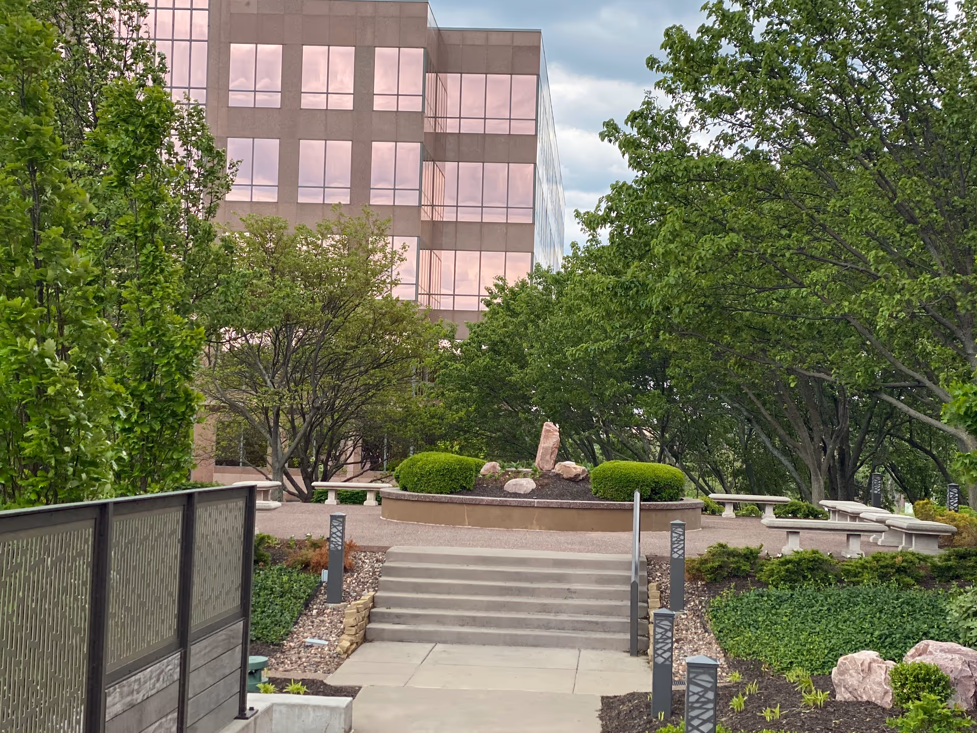 Exterior view of Private Home Care facility with a landscaped courtyard.