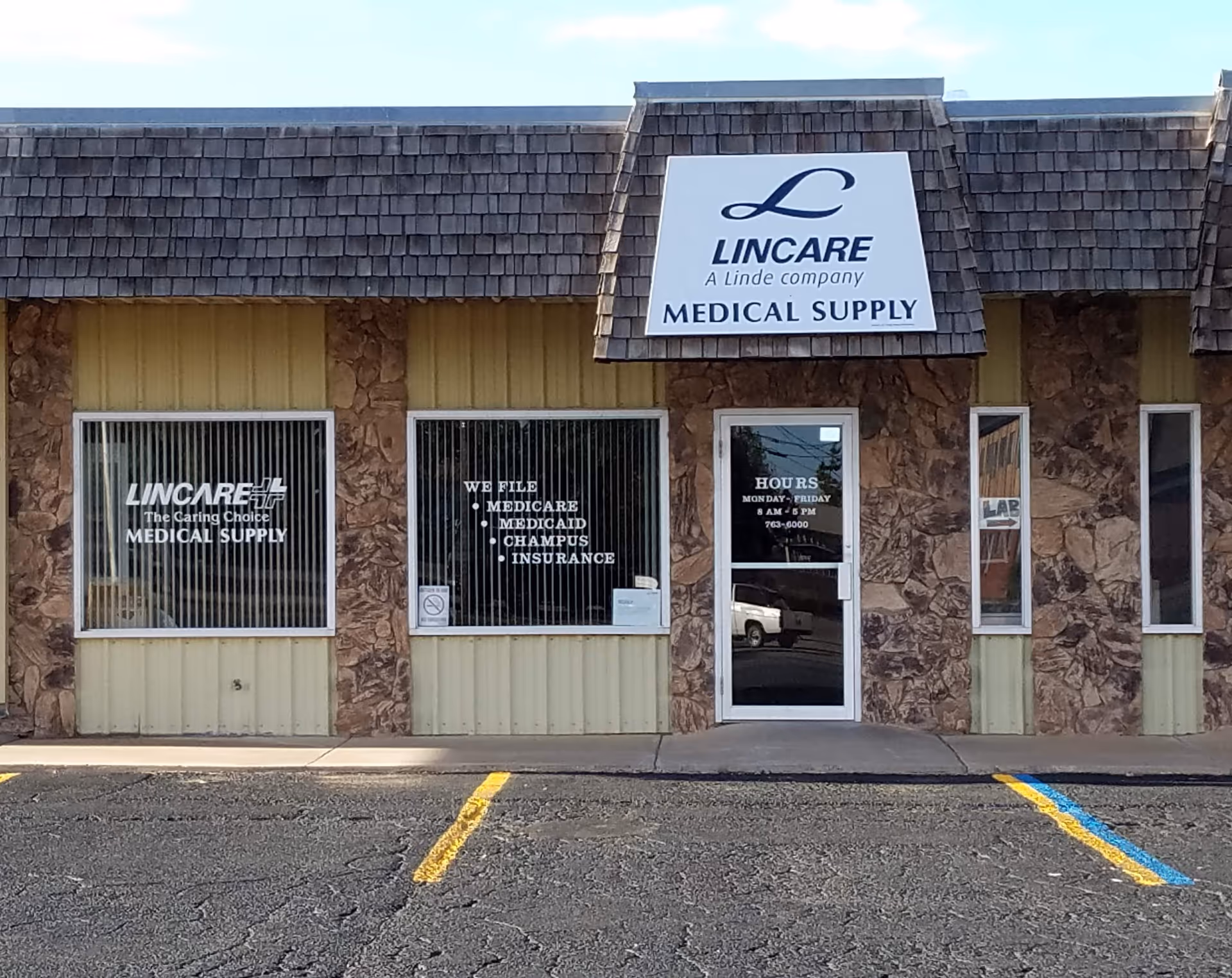 Facade of a LinCare Medical Supply storefront with sign and windows