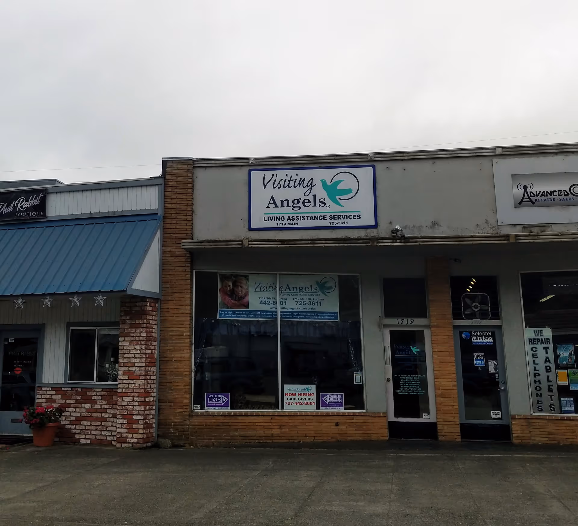 Exterior storefront of Visiting Angels living assistance services in a strip mall.