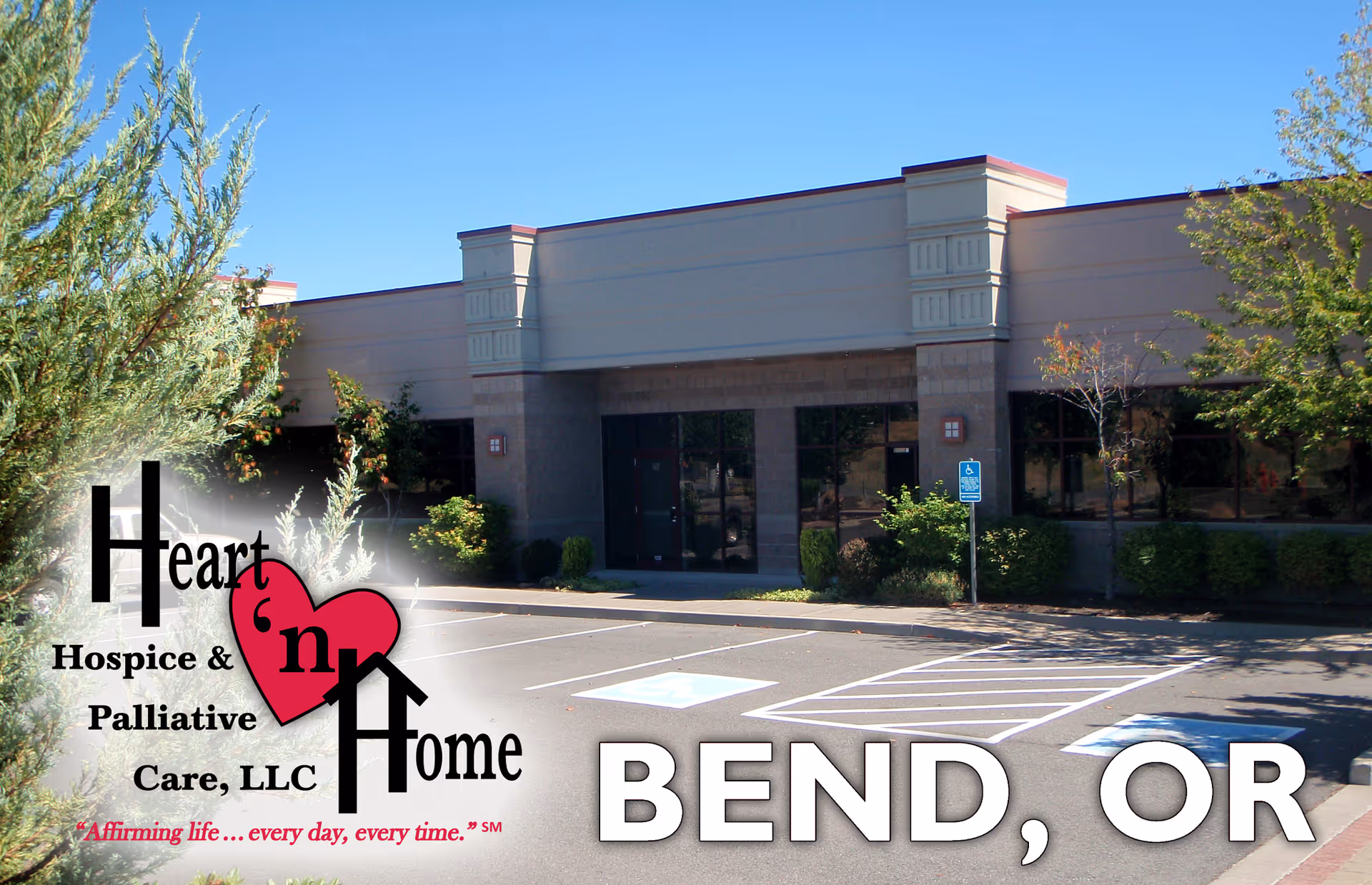 Exterior view of a Heart 'n Home Hospice facility with parking, trees, and clear blue sky.