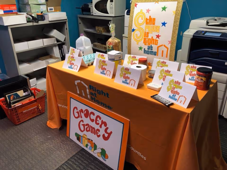 Indoor activity table with grocery game signage at Right at Home Iselin