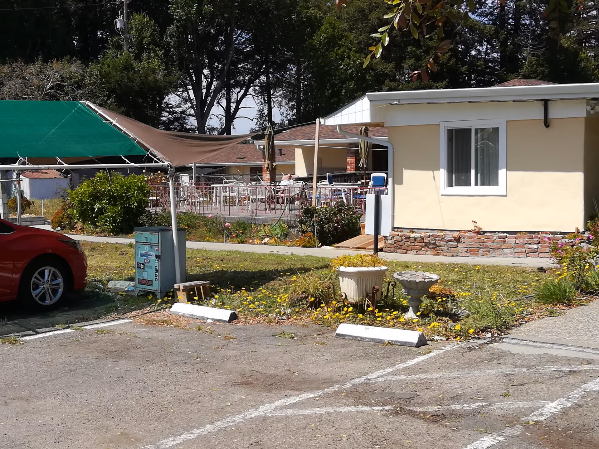 Exterior view of Soquel Leisure Villa with a fenced outdoor patio and seating.
