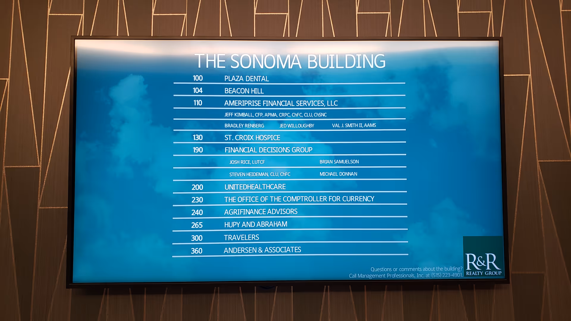 An indoor building directory screen listing tenants, including St. Croix Hospice, with a branded logo.
