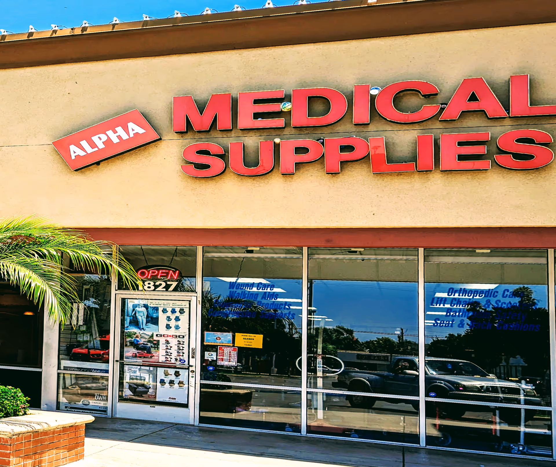 Exterior storefront with Alpha Medical Supplies signage on the facade
