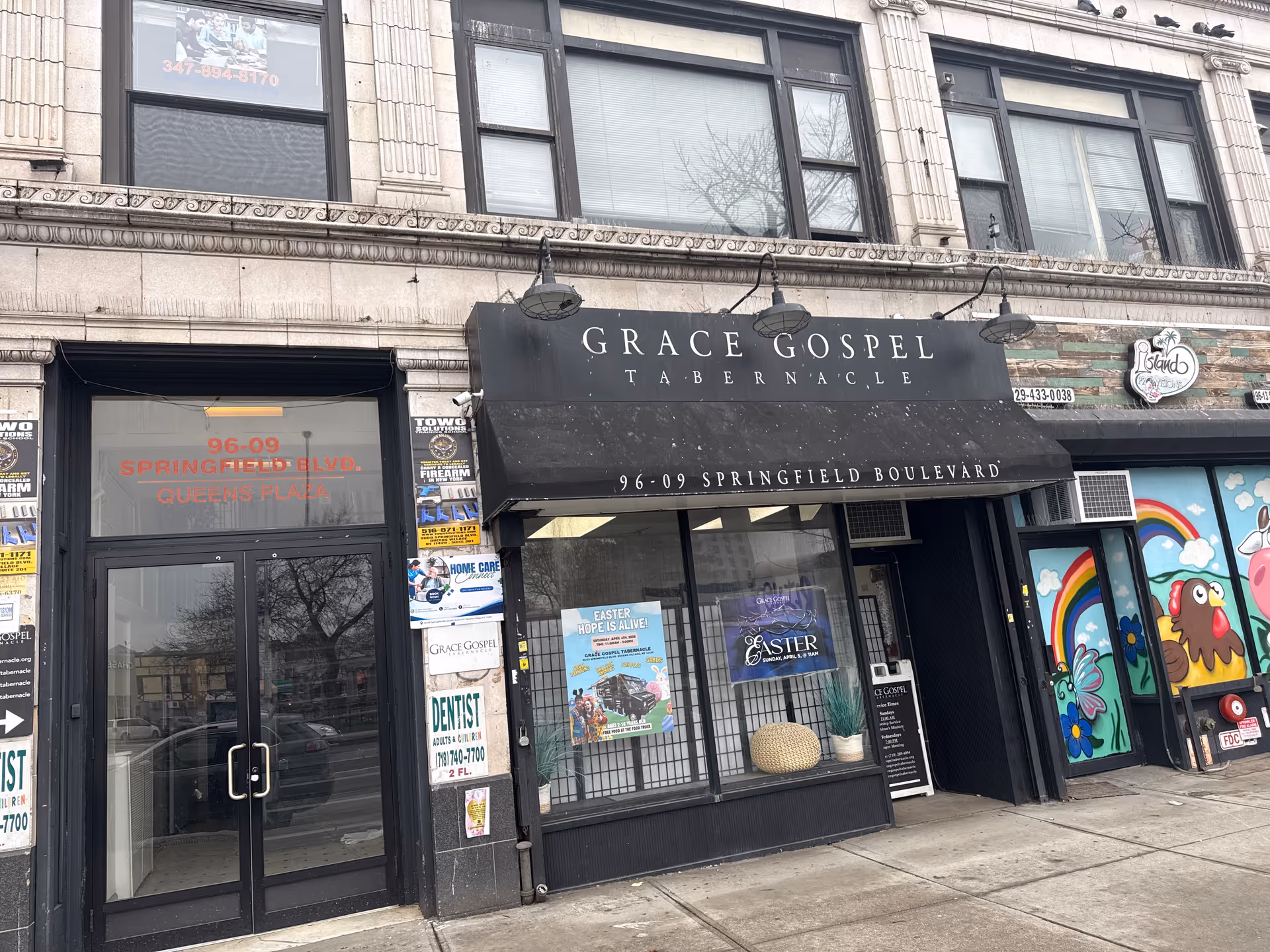 Front exterior of a storefront displaying Grace Gospel Tabernacle signage.