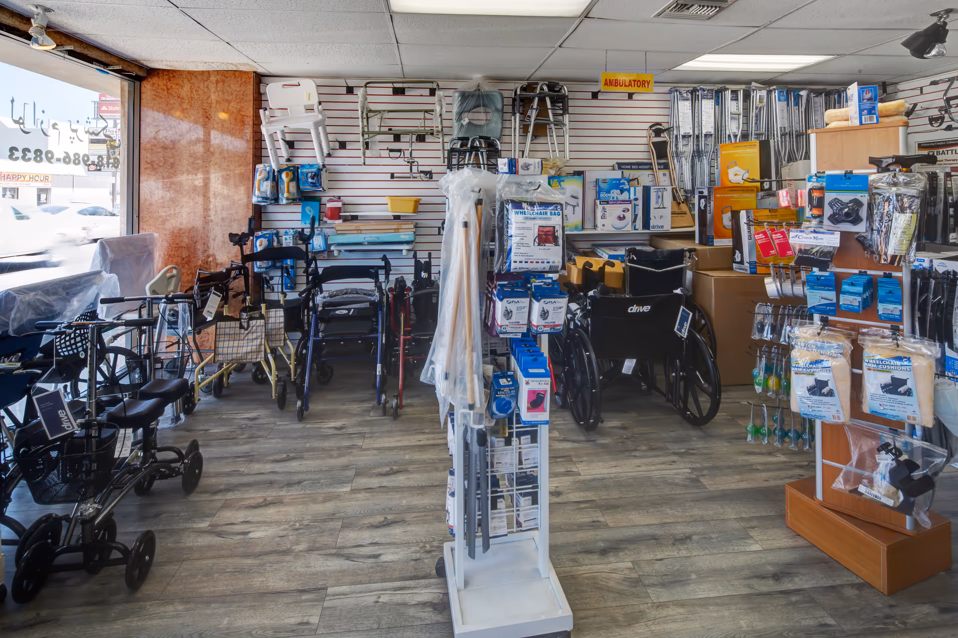 Interior view of Complete Care Medical Supply shop displaying mobility aids and wheelchairs.