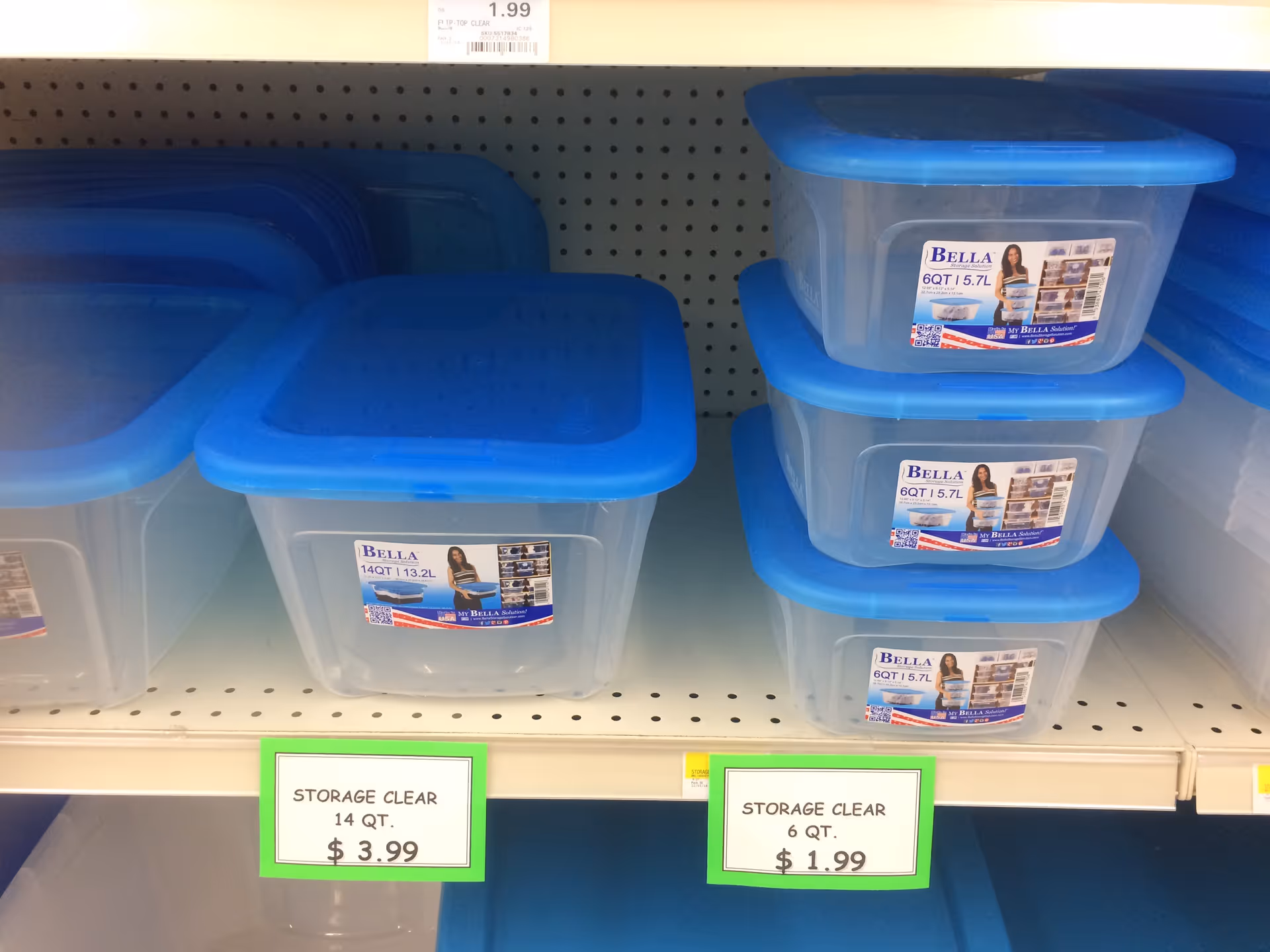 Blue-lidded plastic storage bins on a store shelf with price tags