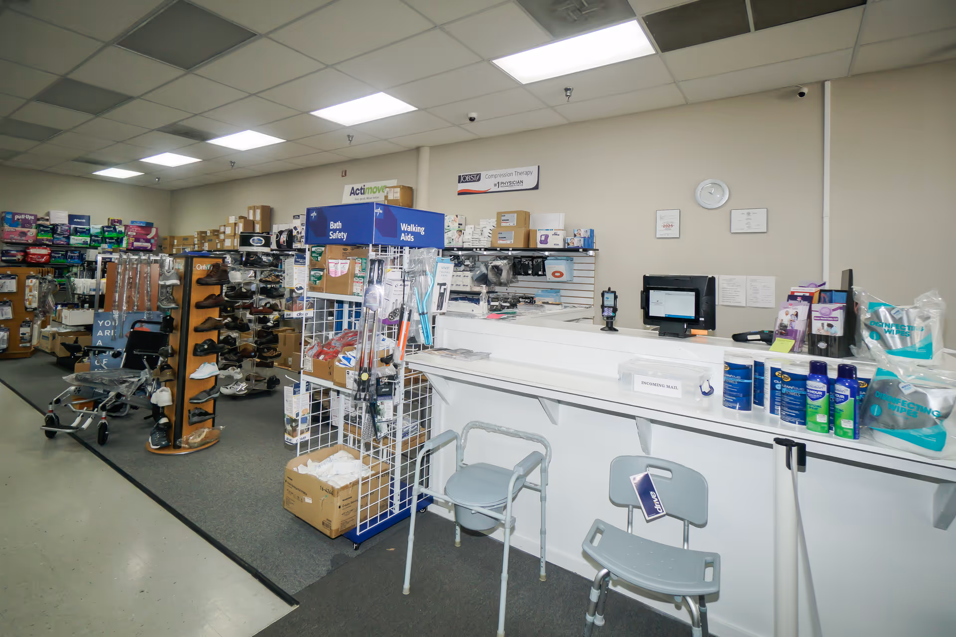 Inside a medical supply store with shelves, displays, and a checkout counter