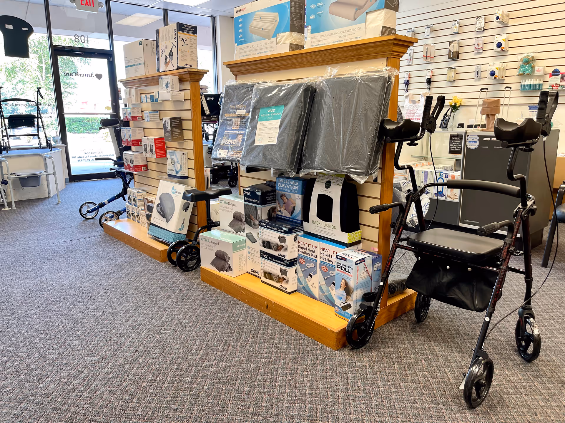 Interior of a medical supply store with shelves, boxes, and mobility aids.