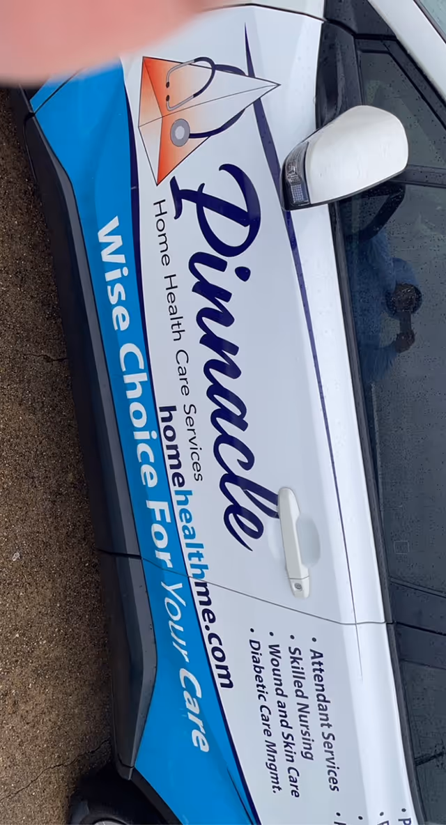 Pinnacle Home Health Care Services van with blue branding parked.