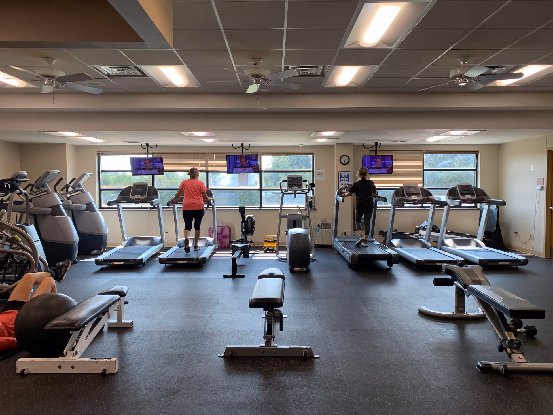 Inside Shenandoah Medical Center gym, residents exercise on treadmills and bikes.