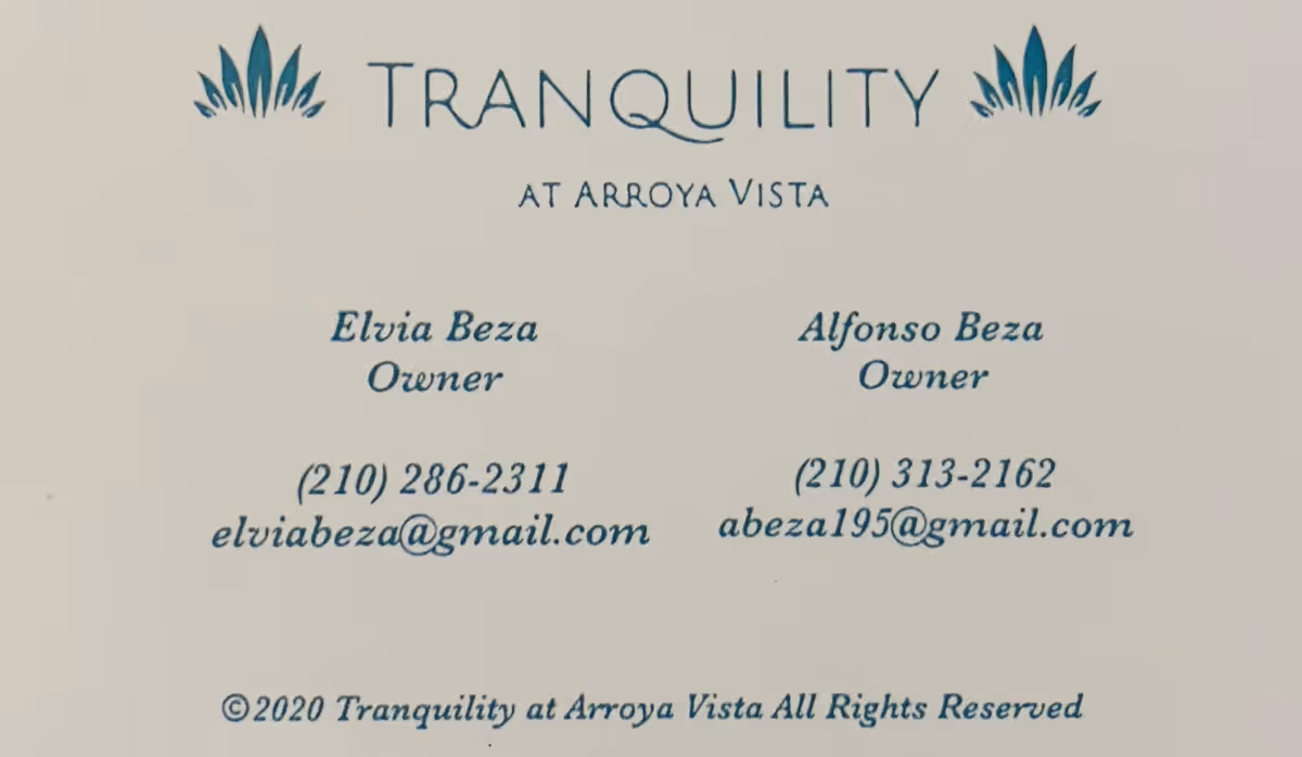 Sign on a wall reads Tranquility at Arroya Vista with owners' names and emails
