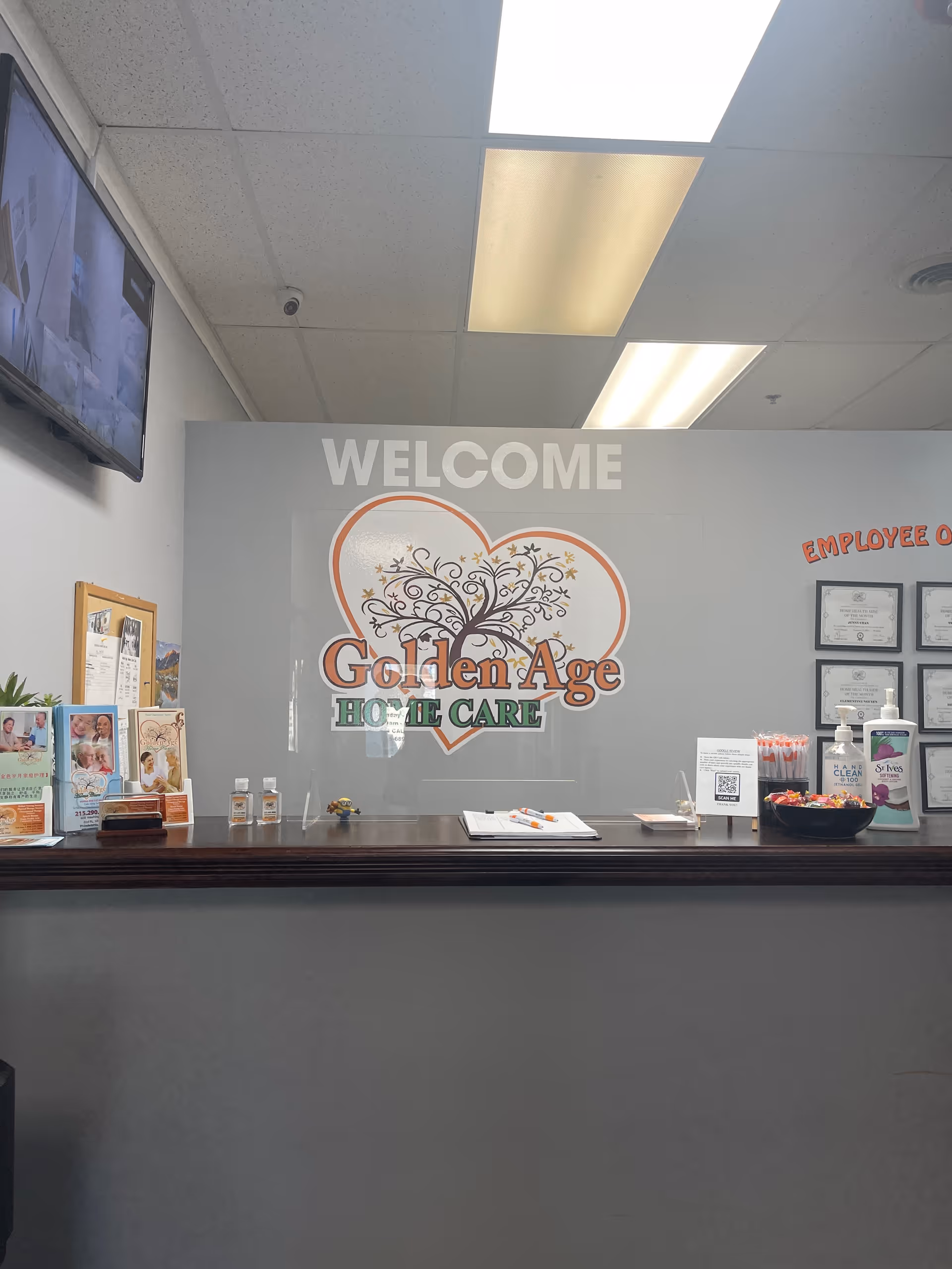 Reception area with a Welcome sign and Golden Age Home Care logo on the wall.
