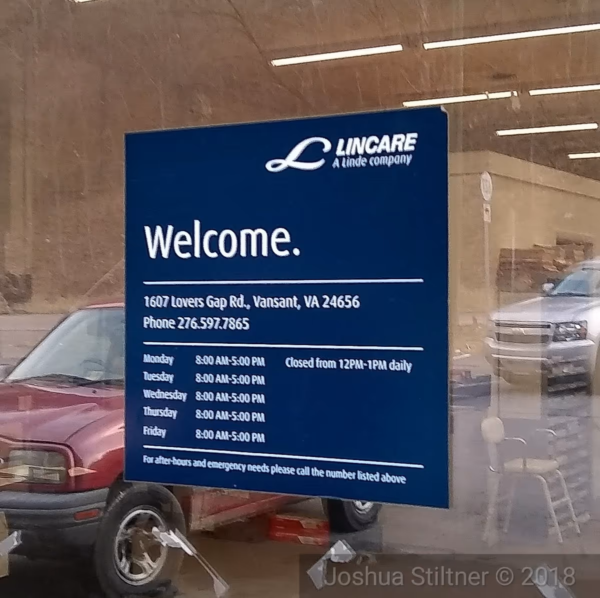 Blue LINCARE sign reading Welcome with hours displayed in storefront window.