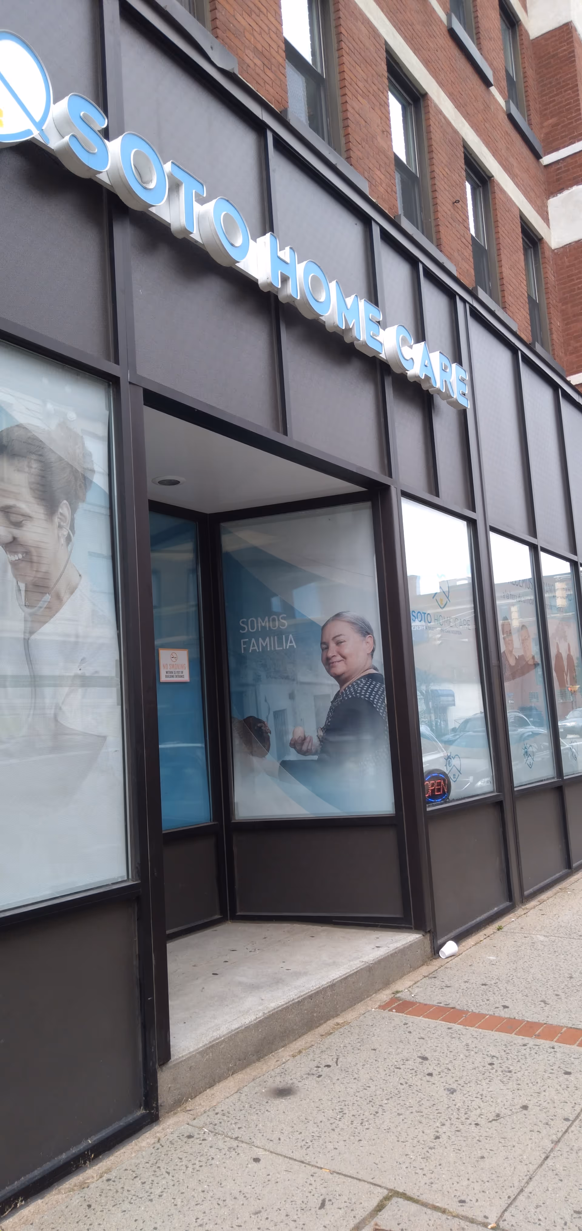 Exterior storefront of Soto Home Care, Inc. with large glass windows and sign.