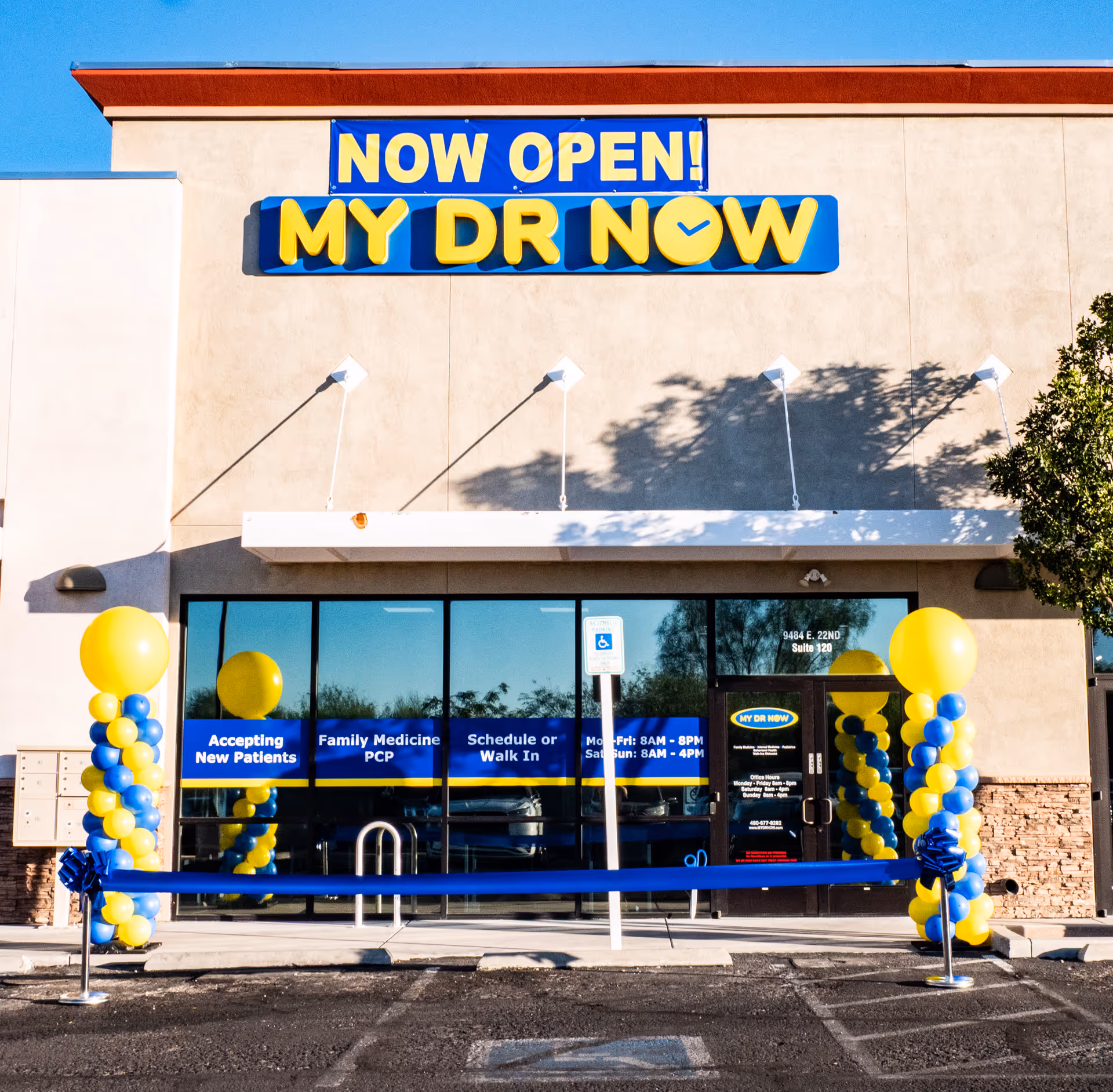 Now Open! My Dr Now clinic storefront with balloons, glass doors, and signage.
