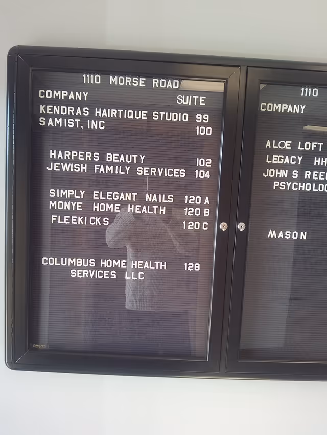 Indoor building directory shows company names and suite numbers at 1110 Morse Road.