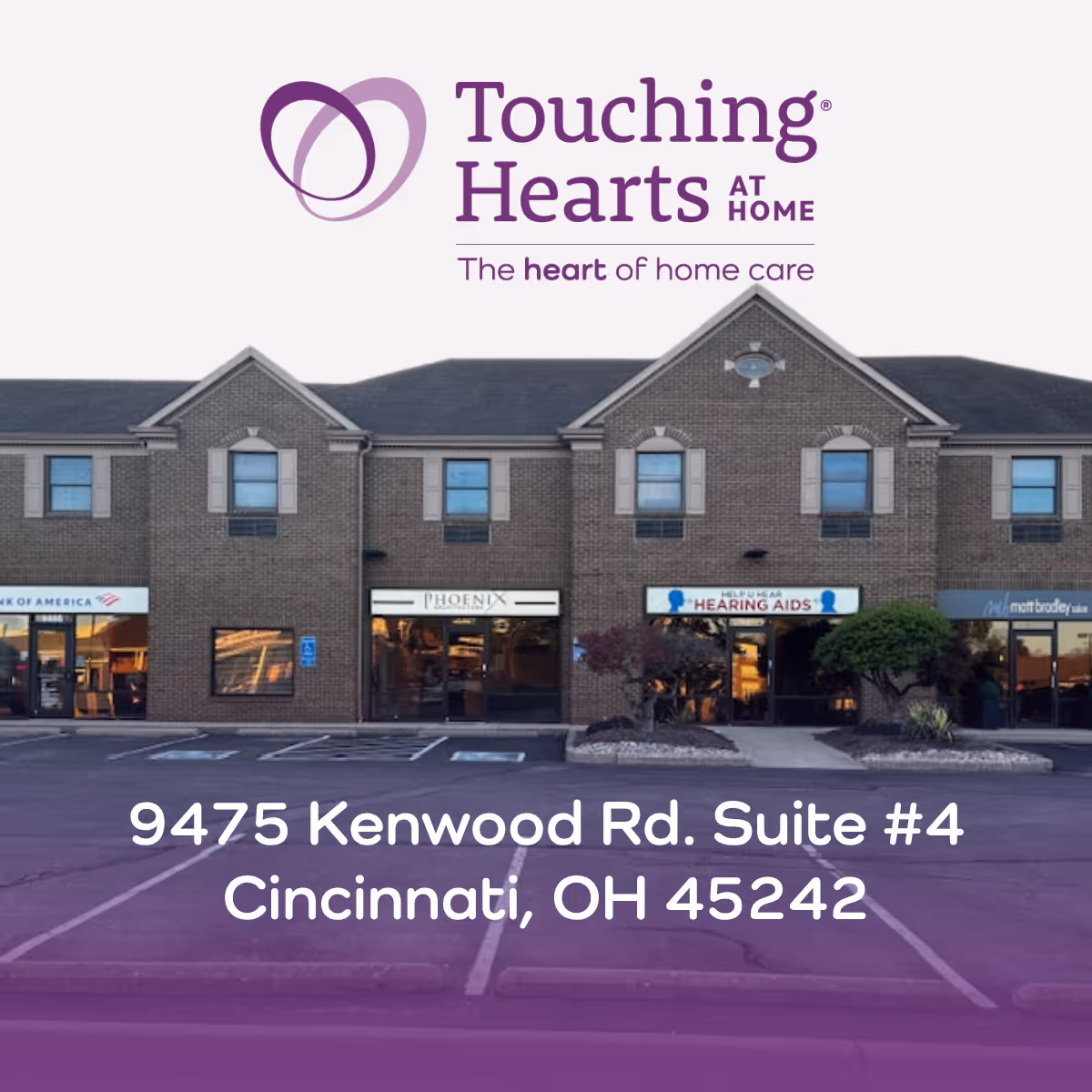 Touching Hearts At Home logo above brick storefronts and a parking lot.